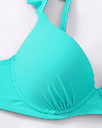 Bikini a tinta unita con reggiseno push-up e volant