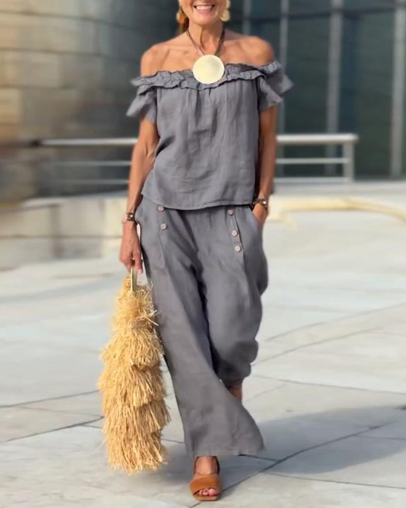 Completo elegante con spalle scoperte