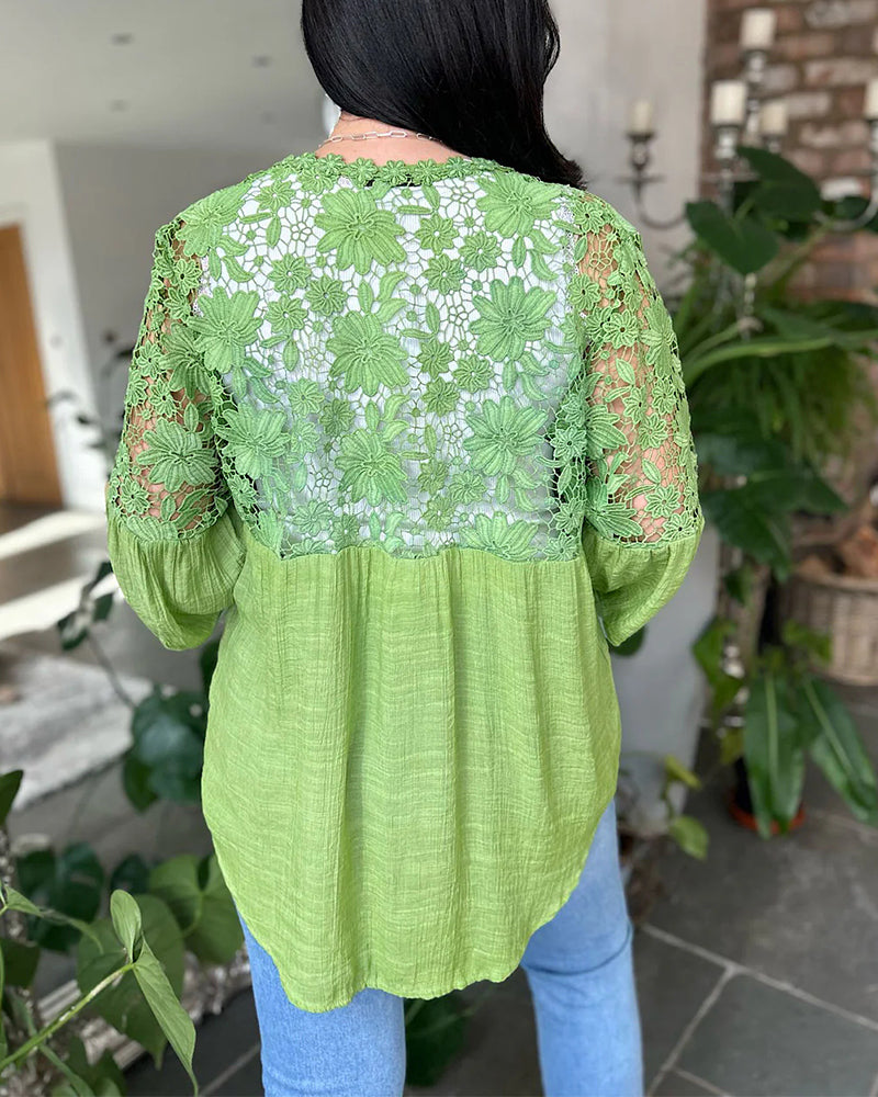 Blusa con pannello floreale in pizzo ampio