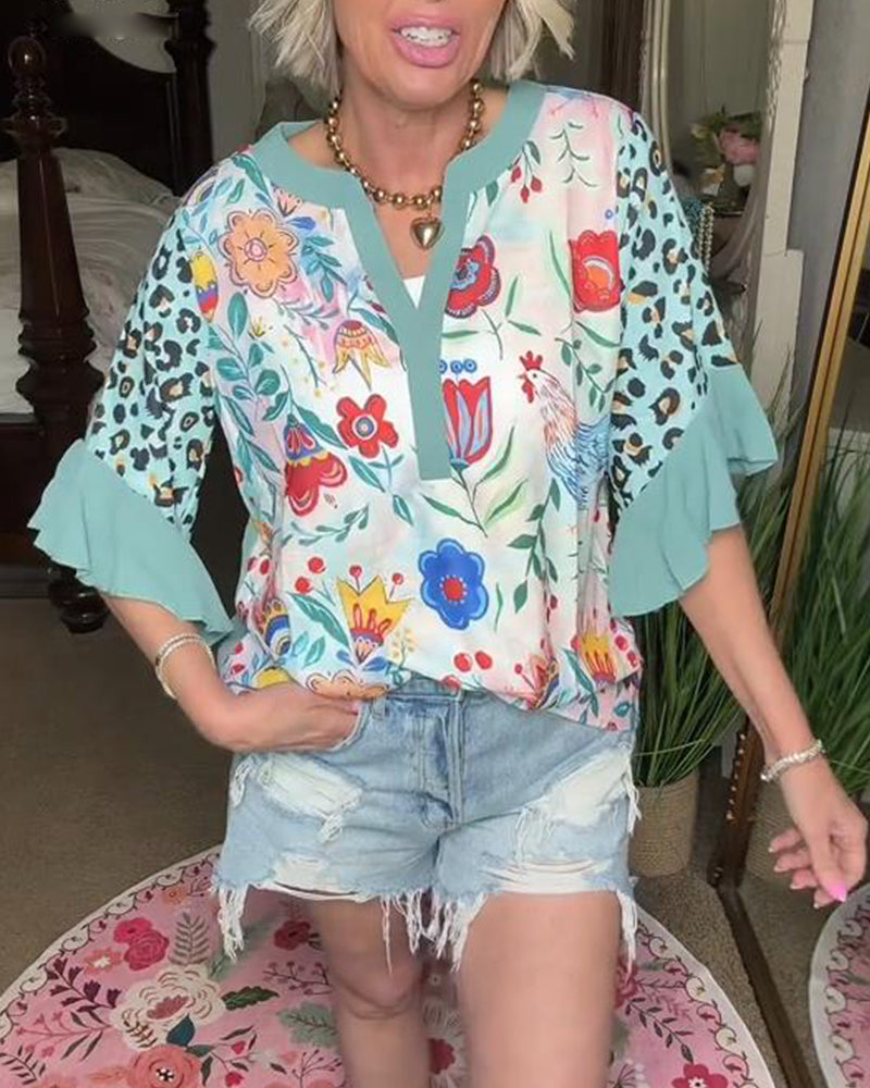 Camicetta con maniche a balze e stampa leopardata