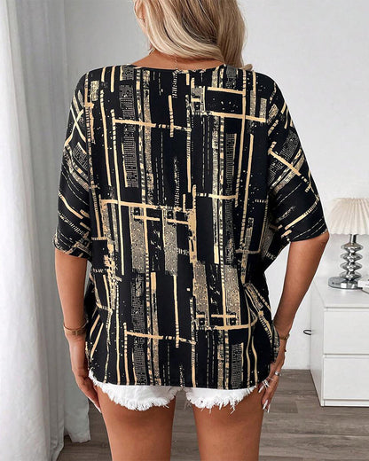 Camicetta stampata con scollo a V retrò e maniche a pipistrello