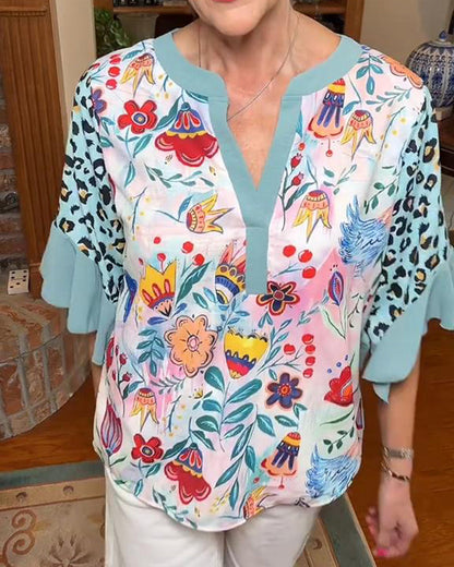 Camicetta con maniche a balze e stampa leopardata