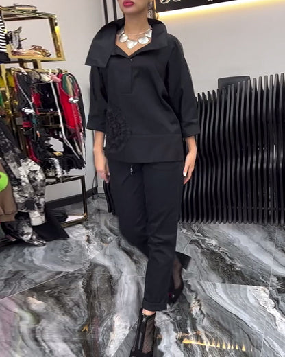 Bluse mit Blumenmuster und Spitzenbesatz am Revers