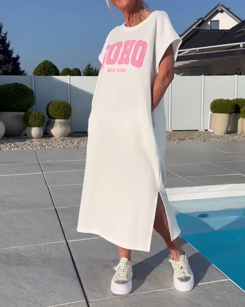 Modisches Kleid mit lockerem Schlitz