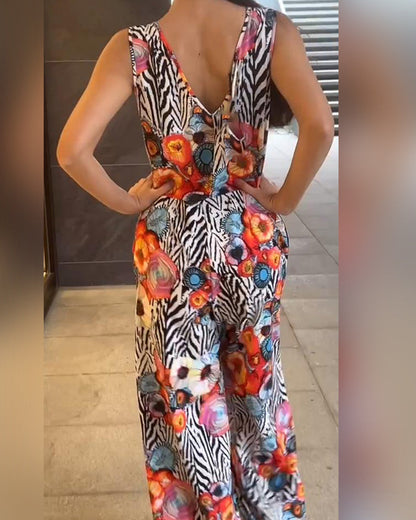 Tuta elegante senza maniche con stampa floreale