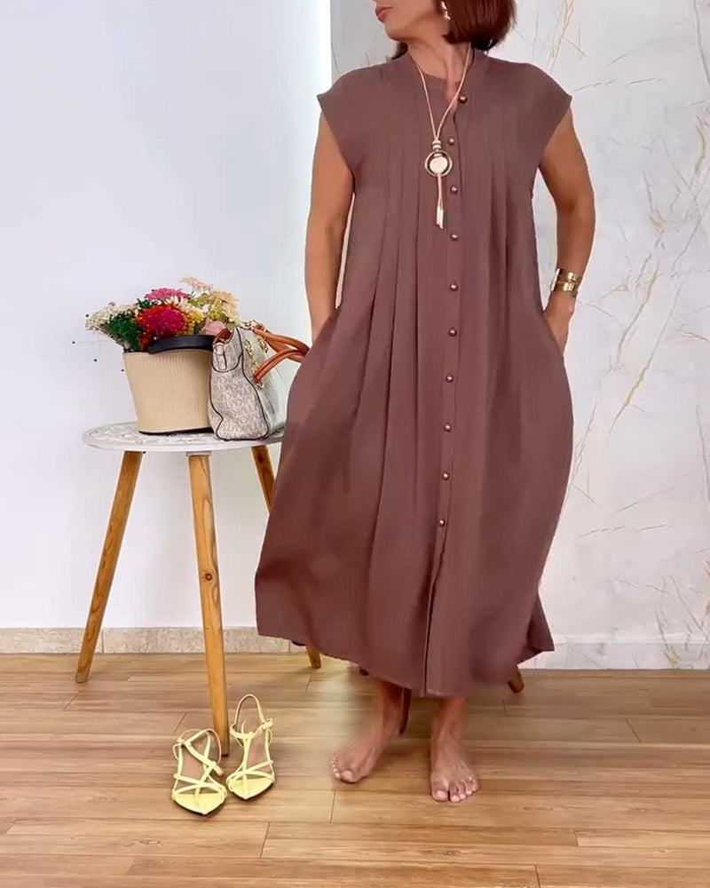 Abito senza maniche con collo alto e vita plissettata